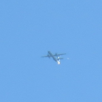 Canadian Photographs UFOs Next to Jet Plane