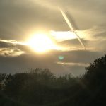 Two People See and Photograph Unusual Blue UFO